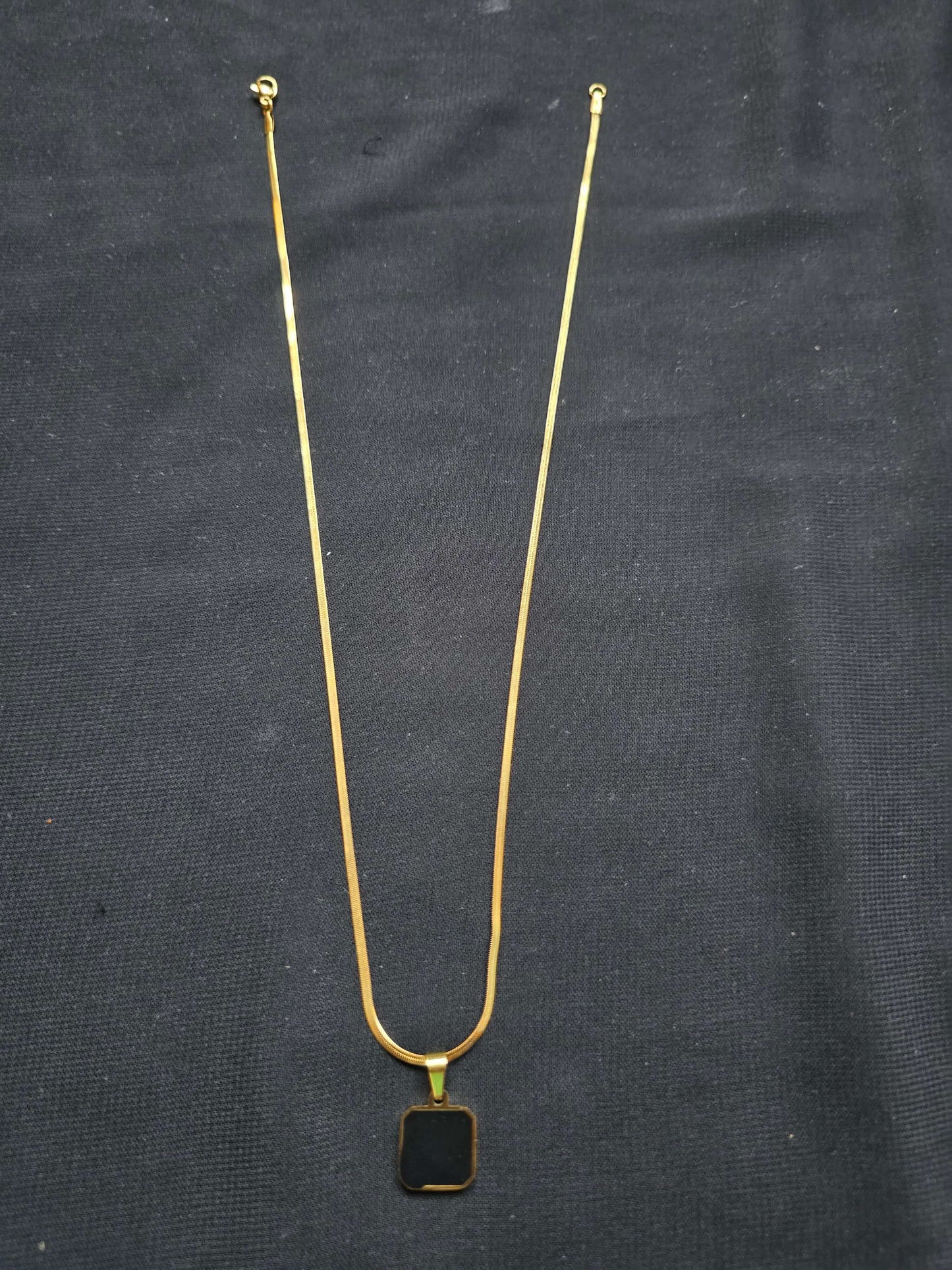 The Nero Emblem – Matte Gold with Obsidian Pendant ⚫