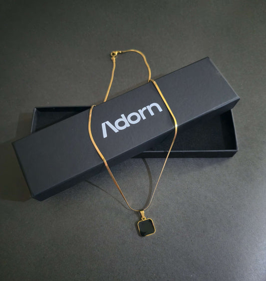 The Nero Emblem – Matte Gold with Obsidian Pendant ⚫